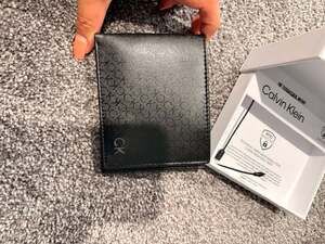 Calvin Klein RFID Protected Leather Bifold Wallet with Monogram Print